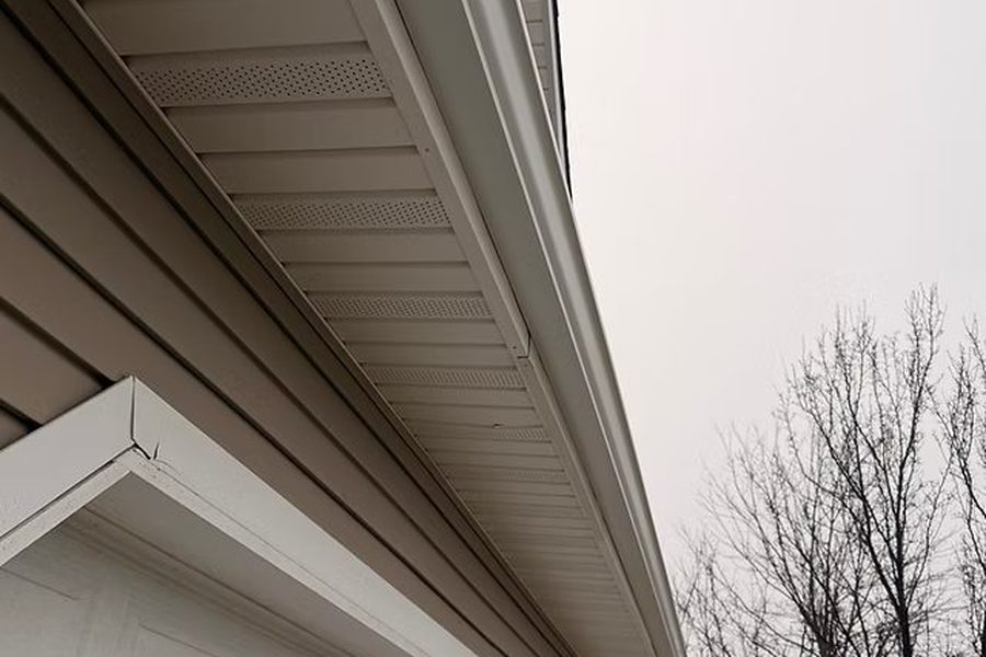 White seamless gutters along the fascia of an Indianapolis home